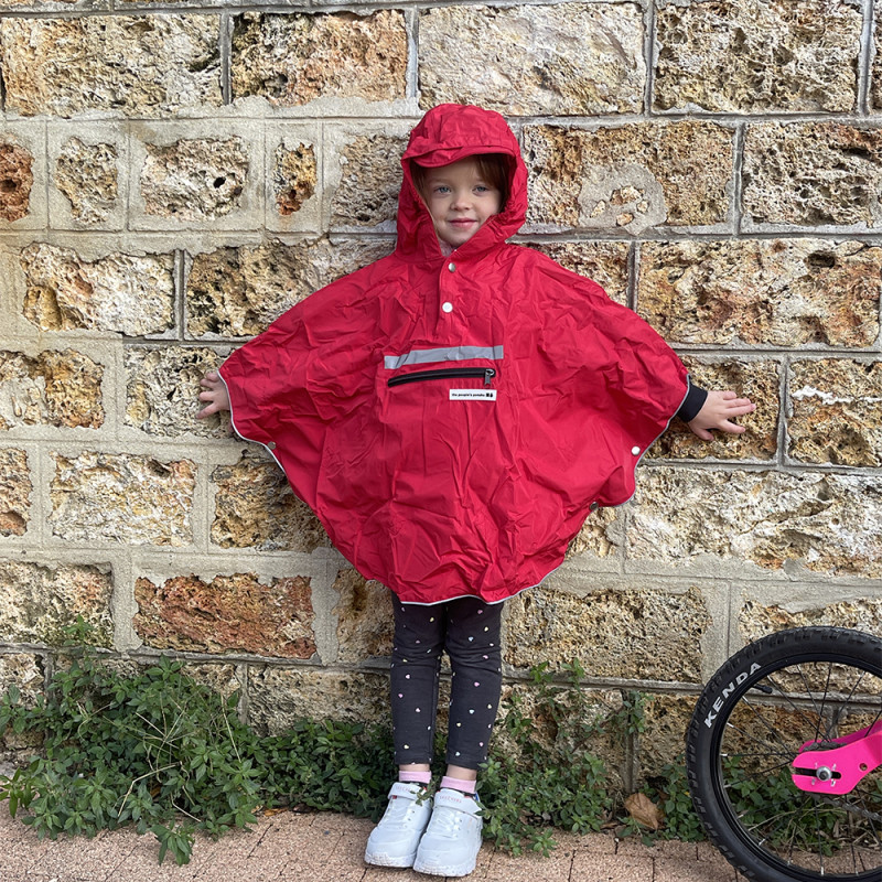 Un poncho anti pluie pour siège enfant / bébé.